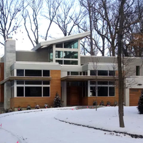 Modern Englewood home with large energy-efficient windows by HS Windows.