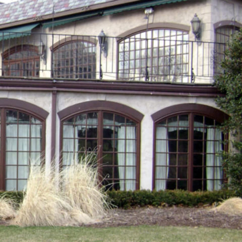 A white house with glass window in Ridgewood