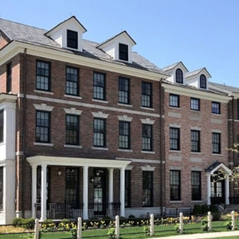 Brick Building with Black-Double-Hung Windows by HS Windows