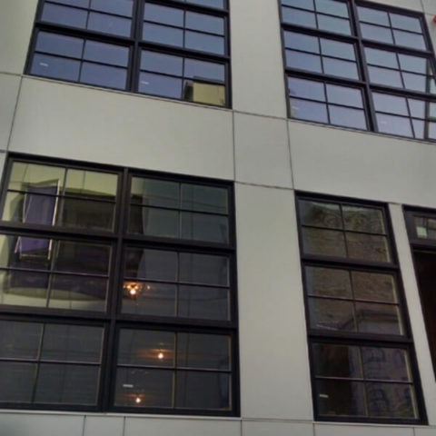 building in hoboken with large windows